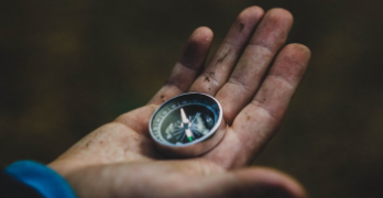 Hand with a compass